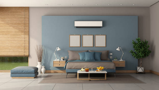 istock Modern master bedroom with minimalist double bed and air conditioner 1225779226