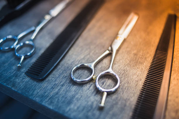 istock combs and scissors for haircuts lie on a shelf in the cabin 1225781297