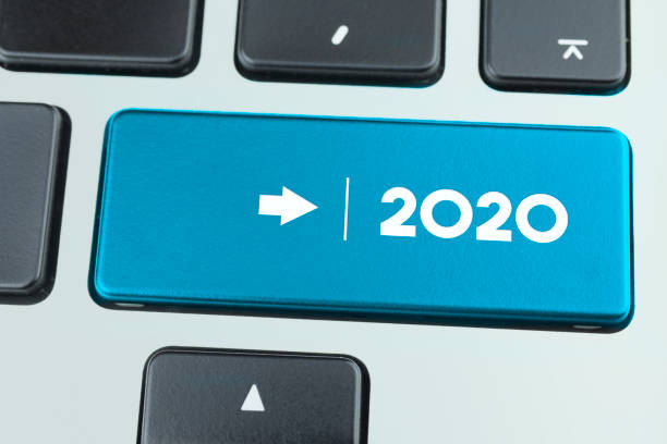 istock Close Up Laptop Key With 2020 Message 1225782687