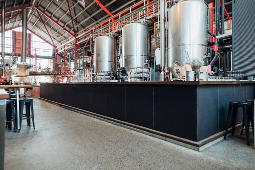 A wide angle view of a working brewery that is also a bar in Perth Australia.