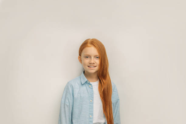 istock positive smiling child with red hair isolated 1225788033