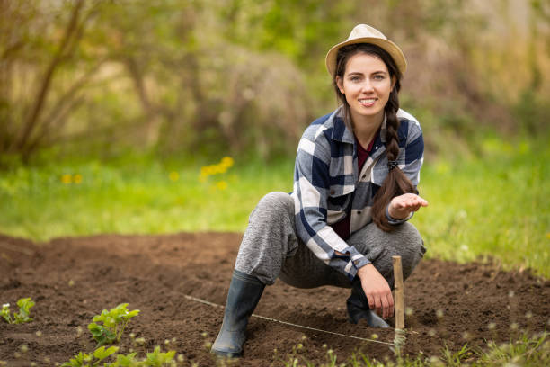 istock farmer planting seeds 1225789123