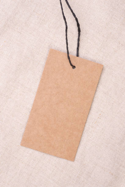 istock Blank price tag isolated on linen background 1225789147