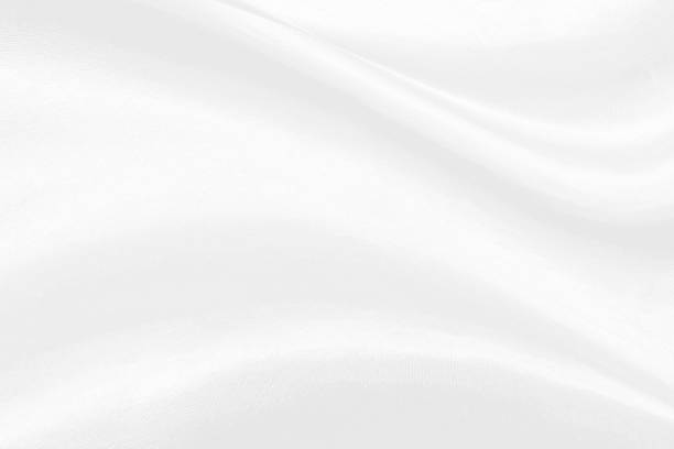 istock White clean folded curved fabric texture for elegant design background design 1225789149