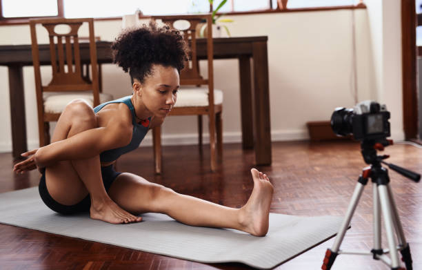 istock Tune into her online yoga class 1225790100