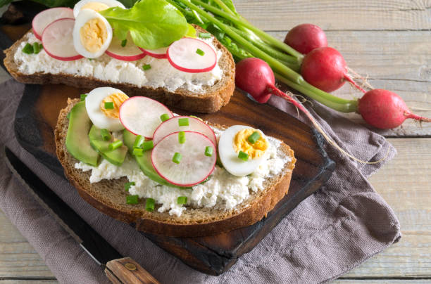 istock Rye bread with butter and radish. 1225790193