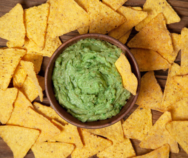 istock guacamole in a wooden bowl 1225790509