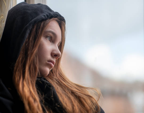 istock depressed teen suffering from child abuse 1225791900