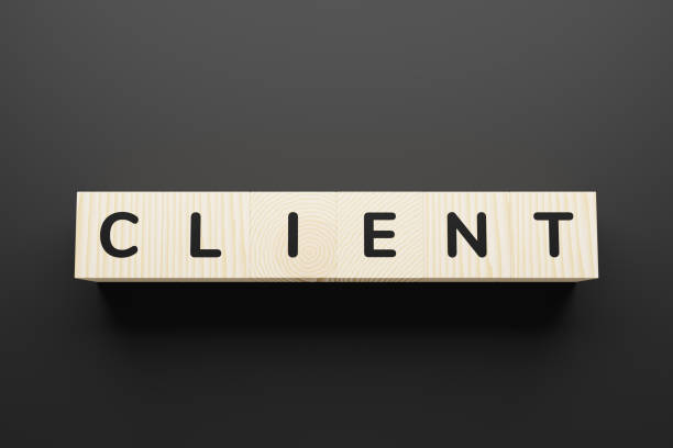 istock Client - a word contained wooden cubes. 1225792093