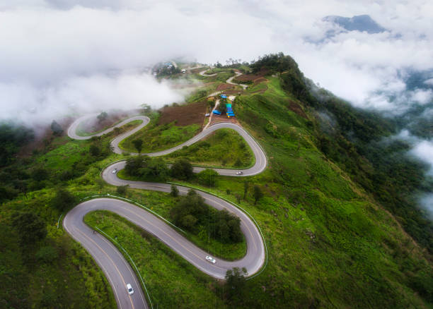 Aerial view (drone shot) of road curve to Phu Tub Berk Mountain, Phetchabun, Thailand. Aerial view (drone shot) of road curve to Phu Tub Berk Mountain, Phetchabun, Thailand. berk stock pictures, royalty-free photos & images