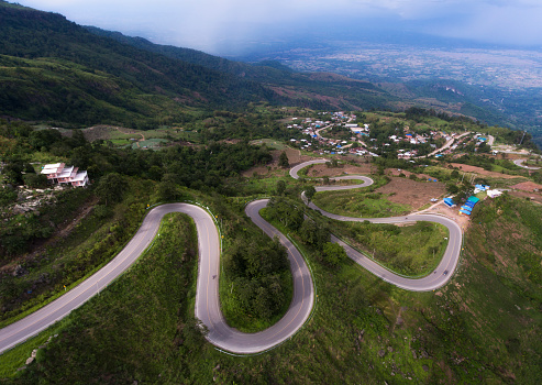 Aerial view (drone shot) of road curve to Phu Tub Berk Mountain, Phetchabun, Thailand.