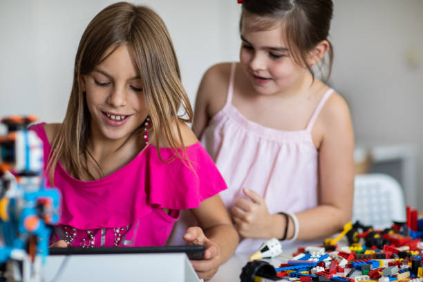 istock Girl using digital tablet at childcare playroom 1225796016