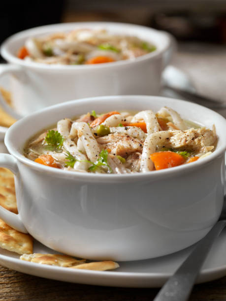 istock Home Made Chicken Soup with Thick Noodles and Crackers 1225796250