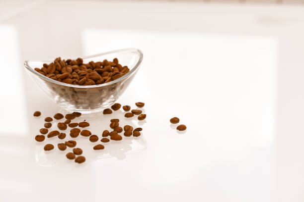 istock coffee beans in a glass bowl 1225802324