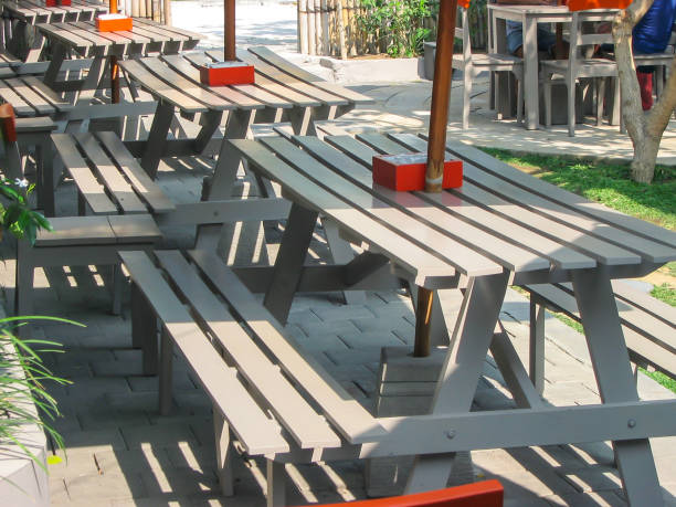 Wooden picnic table isolated in white. Digitally Generated Image