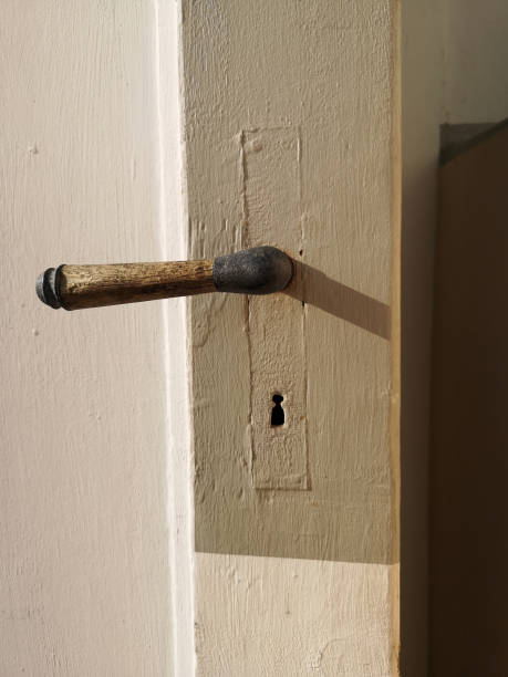 istock door handle on a worn vintage door 1225804661