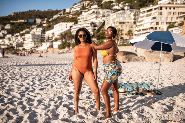 istock Two friends at the beach. 1225810709