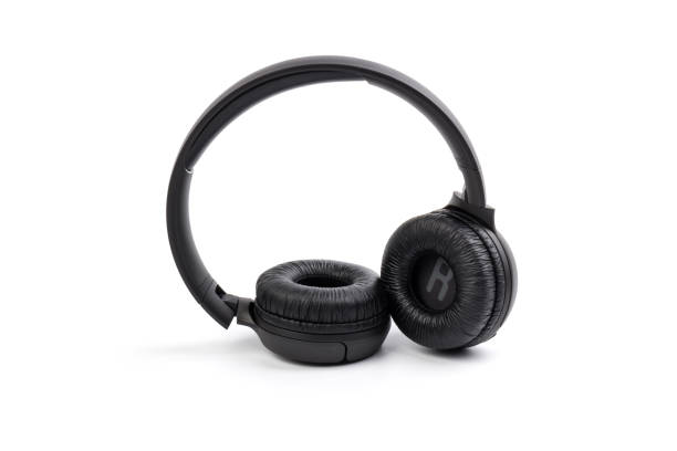 istock Black wireless headphones on white background.  Advanced acoustic stereo sound system 1225810867