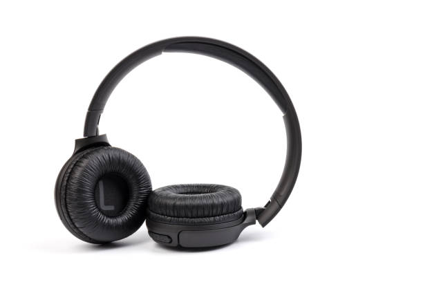istock Black wireless headphones on white background.  Advanced acoustic stereo sound system 1225810916