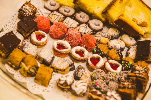 istock Beautiful desserts, sweets and candy table at wedding reception 1225813670