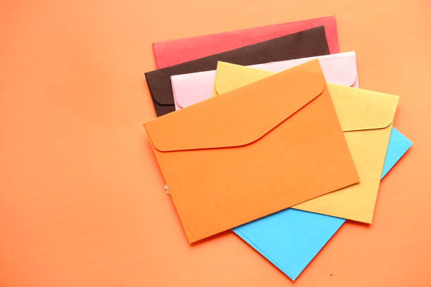 istock high angle view of colorful envelopes on white background 1225813809