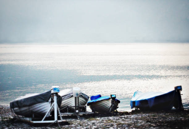 istock Boats on lake side 1225814051