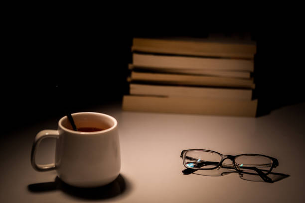 istock Book with cup and glasses stock photo 1225821869