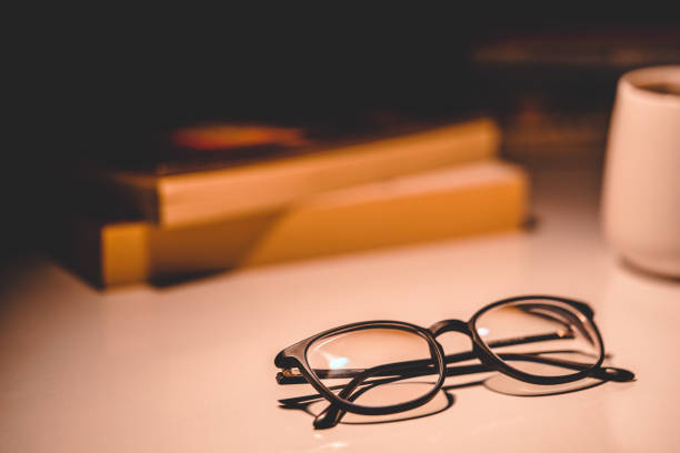 istock Book with cup and glasses stock photo 1225821891