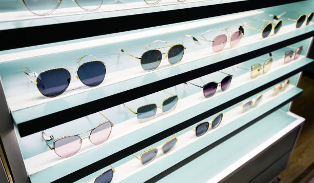 Sunglasses on shelves in a store