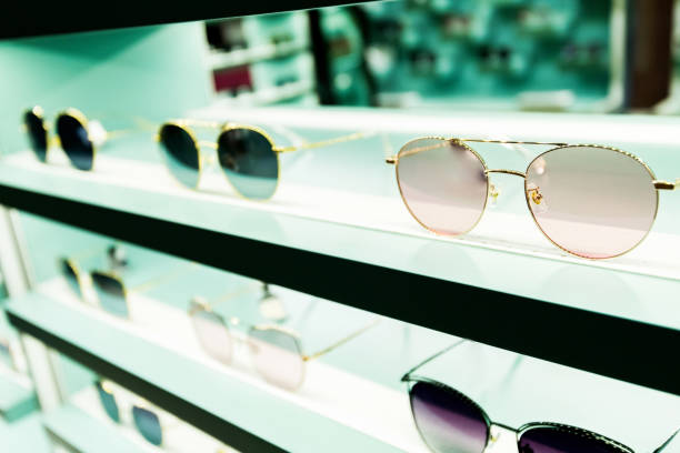 istock Sunglasses on shelves in a store 1225821998