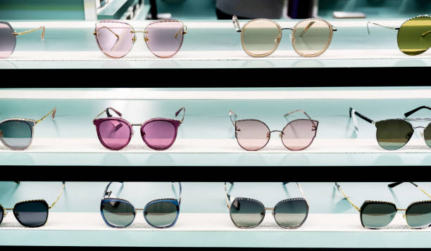 istock Sunglasses on shelves in a store 1225822134