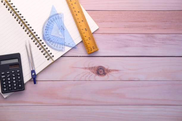 istock Top view of school suppliers on table wth copy space 1225822146