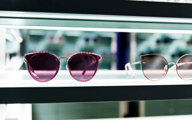 istock Sunglasses on shelves in a store 1225822161