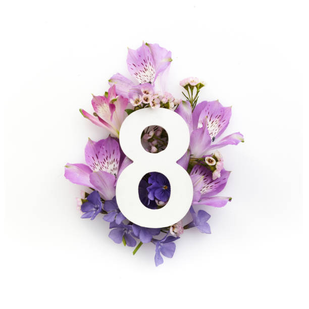 istock Creative layout with colourful flowers and number eight. Flat lay. Top view. 1225827835