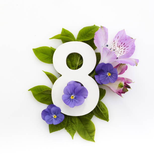 istock Creative layout with colourful flowers and number eight. Flat lay. Top view. 1225827843