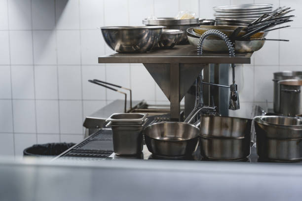 istock Pans, pots and various utensils in commercial professional kitchen 1225828114