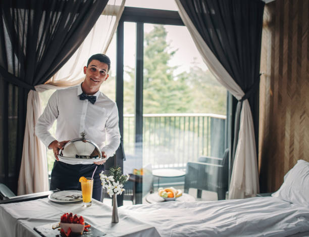 Room service breakfast tray in hotel room Room service breakfast tray in hotel room room service stock pictures, royalty-free photos & images