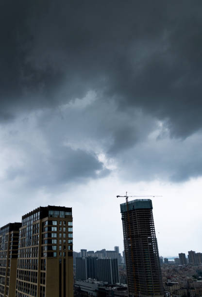 istock Dark storm clouds cover the city 1225830098