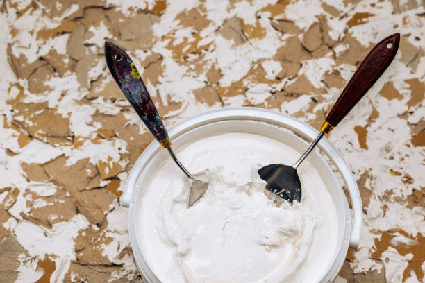 istock White putty, putty knives and spatulas. 1225830455