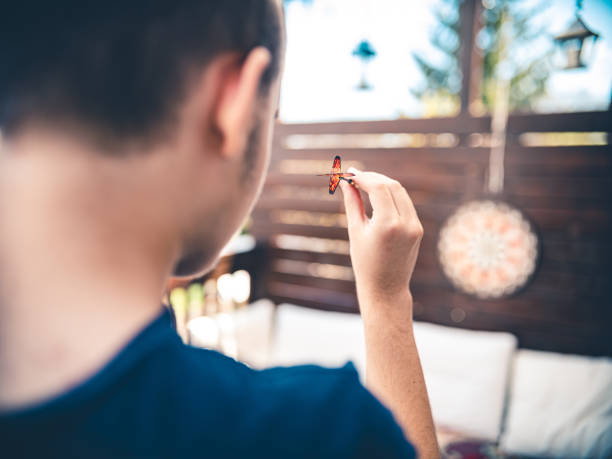 istock Teenager playing Darts outside 1225831494