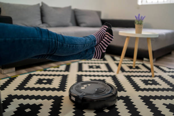 istock Robot vacuum cleaner helps at home 1225846397
