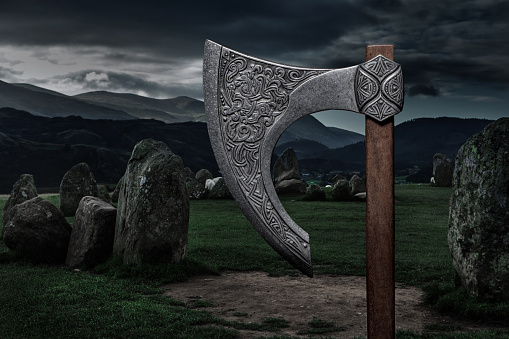 Viking axe and beautiful stone circle in a countryside landscape in the north of England on a beautiful day in September
