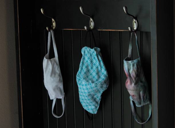 istock Protective Covid19 Masks Hang Ready to Use 1225849478