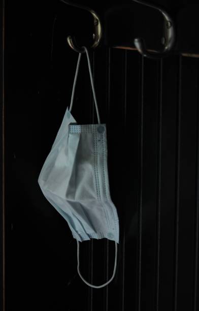 istock Protective Covid19 Masks Hang Ready to Use 1225849483