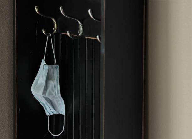 istock Protective Covid19 Masks Hang Ready to Use 1225849501
