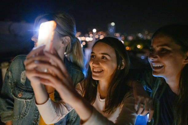 istock Friends capturing moments 1225852639