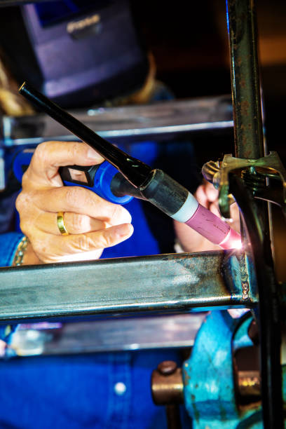 istock Female TIG welder 1225852800