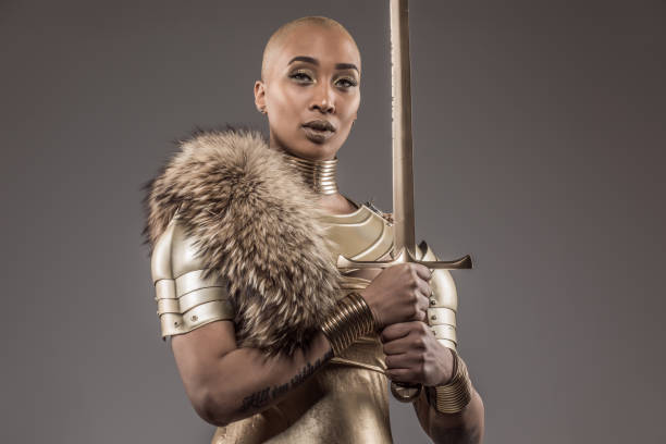 istock Golden viking inspired warrior female in studio shot 1225853396