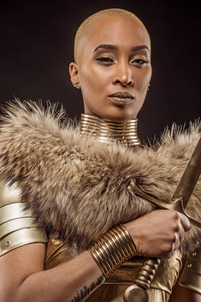 istock Golden viking inspired warrior female in studio shot 1225853597