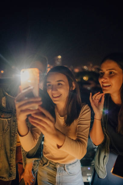 istock Friends capturing moments 1225853819